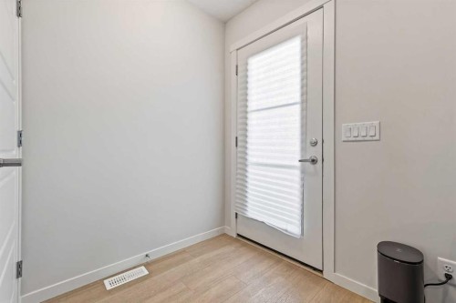 107-474 Seton Circle Se, Calgary, AB - Indoor Photo Showing Other Room