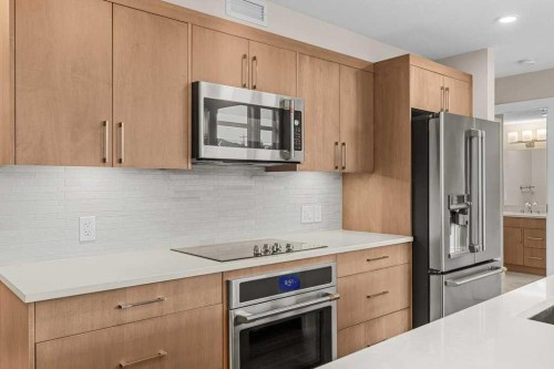 111-810 7Th Street, Canmore, AB - Indoor Photo Showing Kitchen With Upgraded Kitchen