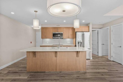 111-810 7Th Street, Canmore, AB - Indoor Photo Showing Kitchen With Upgraded Kitchen