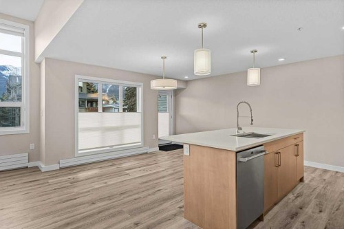 111-810 7Th Street, Canmore, AB - Indoor Photo Showing Kitchen With Upgraded Kitchen