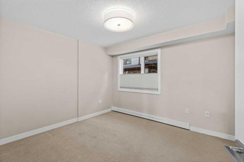 111-810 7Th Street, Canmore, AB - Indoor Photo Showing Other Room