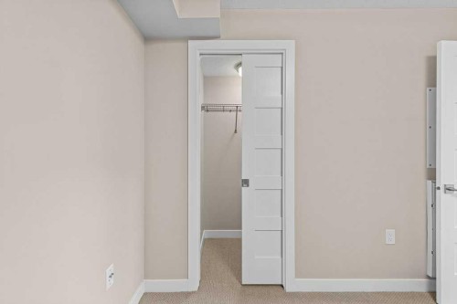 111-810 7Th Street, Canmore, AB - Indoor Photo Showing Other Room