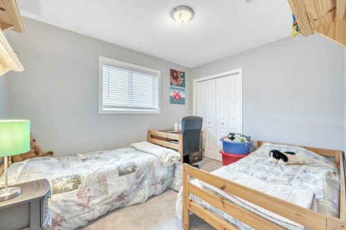 138 Westview Drive, Nanton, AB - Indoor Photo Showing Bedroom