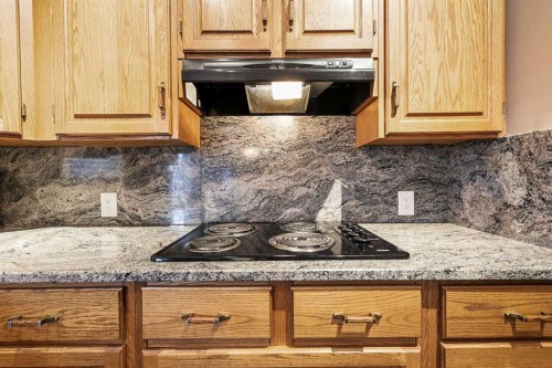 1208 Sunvista Way Se, Calgary, AB - Indoor Photo Showing Kitchen