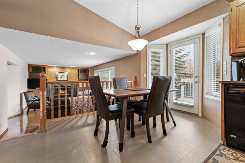 1208 Sunvista Way Se, Calgary, AB - Indoor Photo Showing Dining Room
