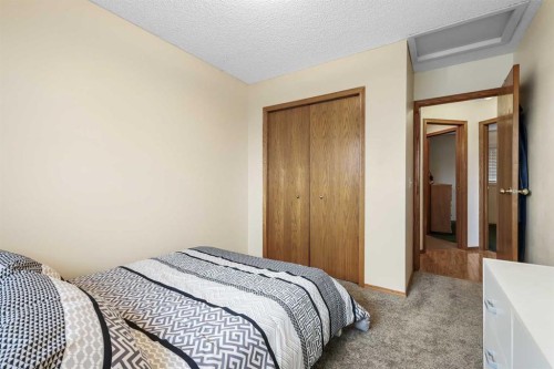 1208 Sunvista Way Se, Calgary, AB - Indoor Photo Showing Bedroom