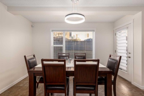 38 Evansbrooke Manor Nw, Calgary, AB - Indoor Photo Showing Dining Room