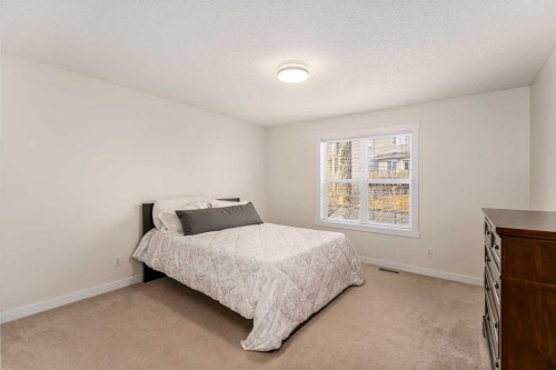 38 Evansbrooke Manor Nw, Calgary, AB - Indoor Photo Showing Bedroom