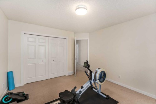 38 Evansbrooke Manor Nw, Calgary, AB - Indoor Photo Showing Other Room