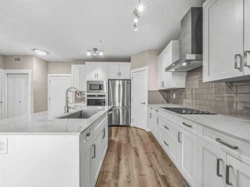 4203-522 Cranford Drive Se, Calgary, AB - Indoor Photo Showing Kitchen With Upgraded Kitchen