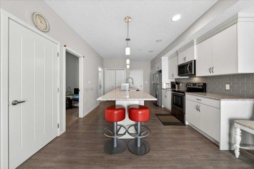 101-20 Seton Park Se, Calgary, AB - Indoor Photo Showing Kitchen