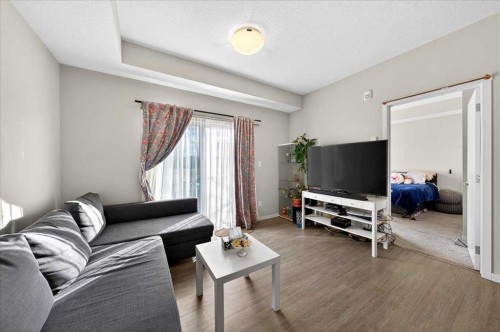 101-20 Seton Park Se, Calgary, AB - Indoor Photo Showing Living Room