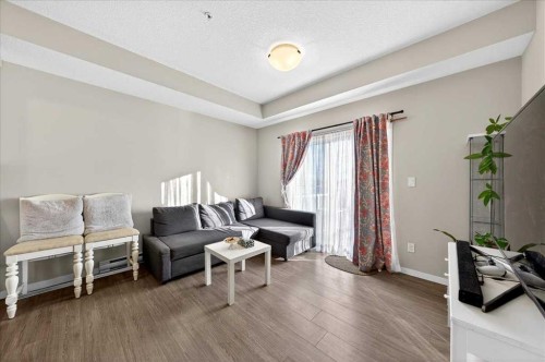 101-20 Seton Park Se, Calgary, AB - Indoor Photo Showing Living Room