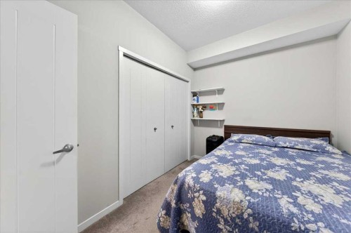 101-20 Seton Park Se, Calgary, AB - Indoor Photo Showing Bedroom