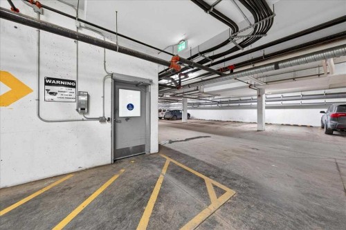 101-20 Seton Park Se, Calgary, AB - Indoor Photo Showing Garage