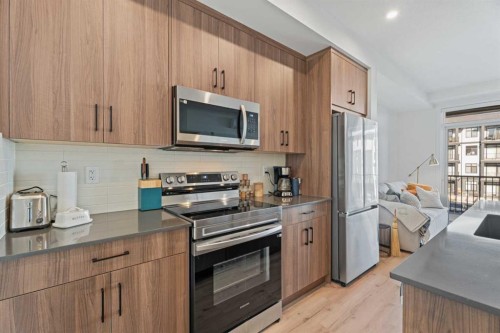 215-70 Sage Hill Walk Nw, Calgary, AB - Indoor Photo Showing Kitchen With Stainless Steel Kitchen