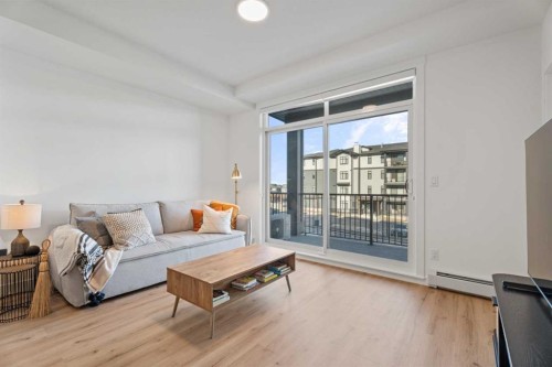215-70 Sage Hill Walk Nw, Calgary, AB - Indoor Photo Showing Living Room