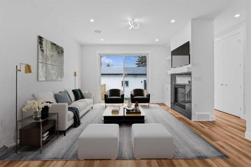 430 33 Avenue Nw, Calgary, AB - Indoor Photo Showing Living Room With Fireplace