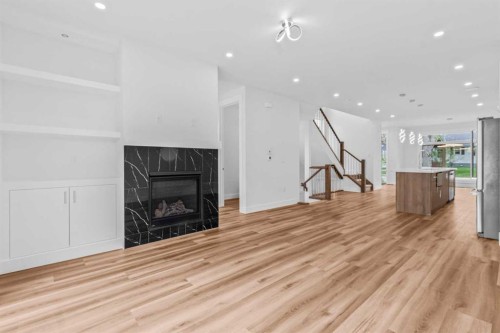430 33 Avenue Nw, Calgary, AB - Indoor Photo Showing Other Room With Fireplace