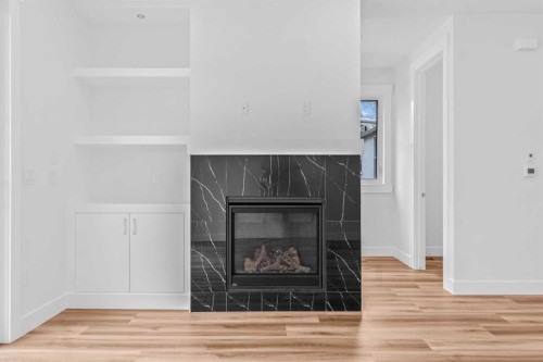 430 33 Avenue Nw, Calgary, AB - Indoor With Fireplace