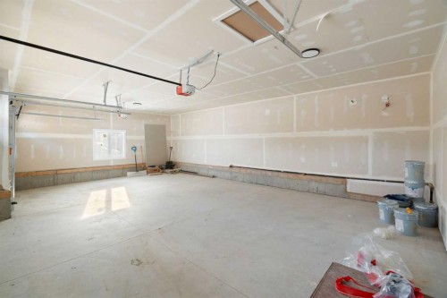 150 Muirfield Boulevard, Lyalta, AB - Indoor Photo Showing Garage