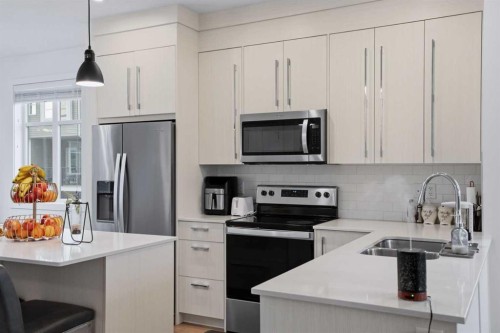 1231 Cornerstone Street Ne, Calgary, AB - Indoor Photo Showing Kitchen With Upgraded Kitchen