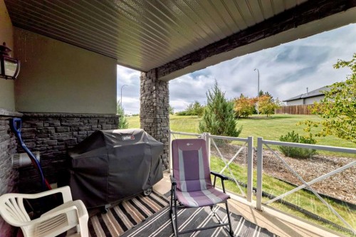 102-1005A Westmount Drive, Strathmore, AB - Outdoor With Deck Patio Veranda With Exterior