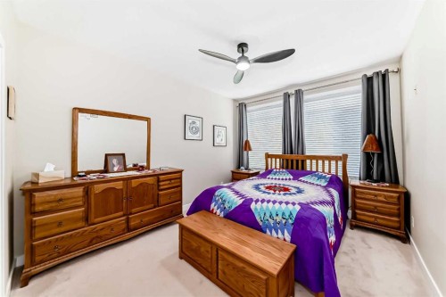 102-1005A Westmount Drive, Strathmore, AB - Indoor Photo Showing Bedroom