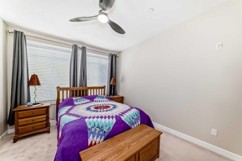 102-1005A Westmount Drive, Strathmore, AB - Indoor Photo Showing Bedroom