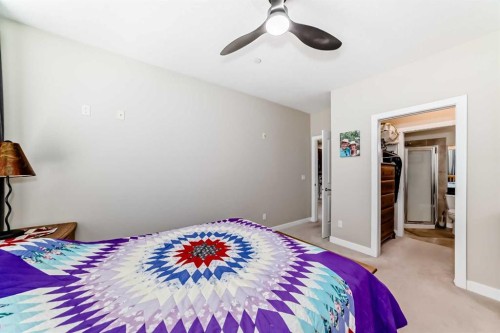 102-1005A Westmount Drive, Strathmore, AB - Indoor Photo Showing Bedroom