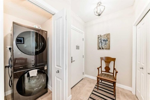 102-1005A Westmount Drive, Strathmore, AB - Indoor Photo Showing Laundry Room