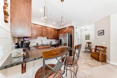 102-1005A Westmount Drive, Strathmore, AB - Indoor Photo Showing Kitchen