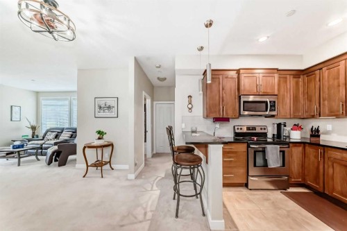 102-1005A Westmount Drive, Strathmore, AB - Indoor Photo Showing Kitchen