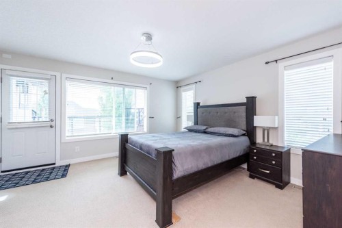 35 Aspen Stone Way Sw, Calgary, AB - Indoor Photo Showing Bedroom