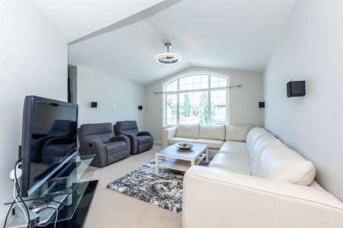 35 Aspen Stone Way Sw, Calgary, AB - Indoor Photo Showing Living Room