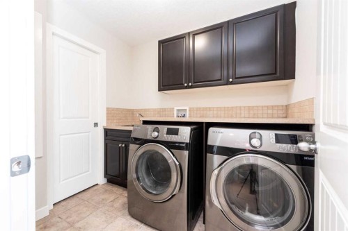 35 Aspen Stone Way Sw, Calgary, AB - Indoor Photo Showing Laundry Room