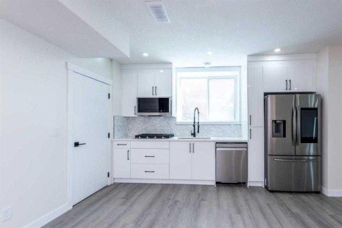 35 Aspen Stone Way Sw, Calgary, AB - Indoor Photo Showing Kitchen With Stainless Steel Kitchen