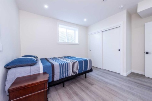 35 Aspen Stone Way Sw, Calgary, AB - Indoor Photo Showing Bedroom