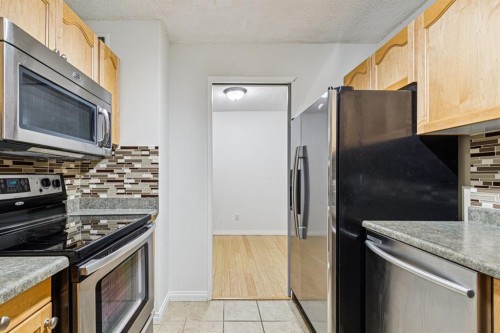 404-537 14 Avenue Sw, Calgary, AB - Indoor Photo Showing Kitchen With Stainless Steel Kitchen