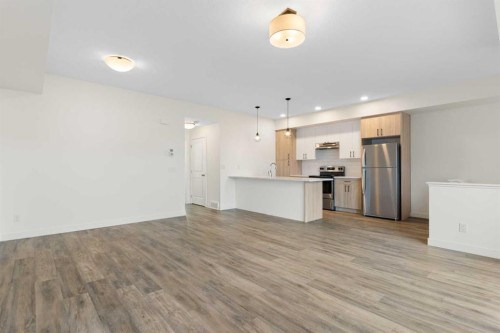 1803-24 Rivercrest Drive, Cochrane, AB - Indoor Photo Showing Kitchen