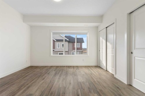 1803-24 Rivercrest Drive, Cochrane, AB - Indoor Photo Showing Other Room