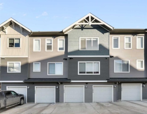 1803-24 Rivercrest Drive, Cochrane, AB - Outdoor With Facade