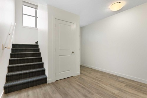 1803-24 Rivercrest Drive, Cochrane, AB - Indoor Photo Showing Other Room