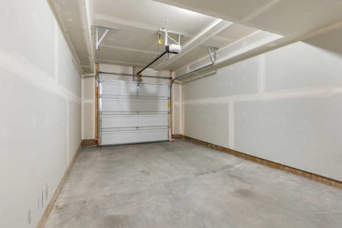 1803-24 Rivercrest Drive, Cochrane, AB - Indoor Photo Showing Garage