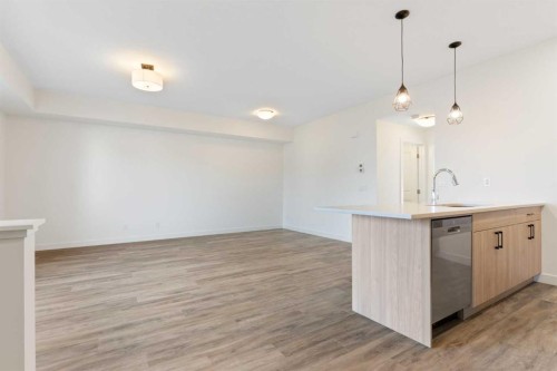 1803-24 Rivercrest Drive, Cochrane, AB - Indoor Photo Showing Kitchen