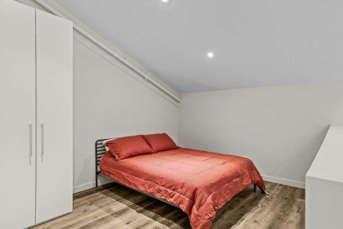 202B-1 Industrial Place, Canmore, AB - Indoor Photo Showing Bedroom
