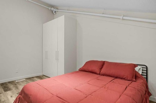 202B-1 Industrial Place, Canmore, AB - Indoor Photo Showing Bedroom