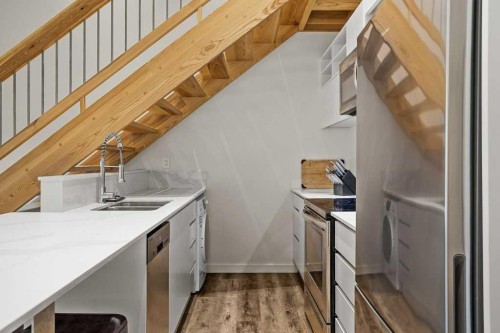202B-1 Industrial Place, Canmore, AB - Indoor Photo Showing Kitchen With Double Sink