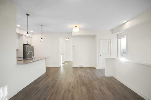 1301-24 Rivercrest Drive, Cochrane, AB - Indoor Photo Showing Kitchen