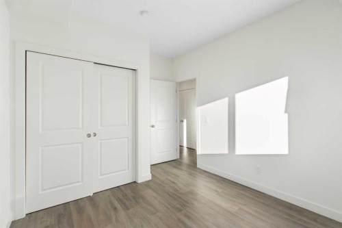 1301-24 Rivercrest Drive, Cochrane, AB - Indoor Photo Showing Other Room